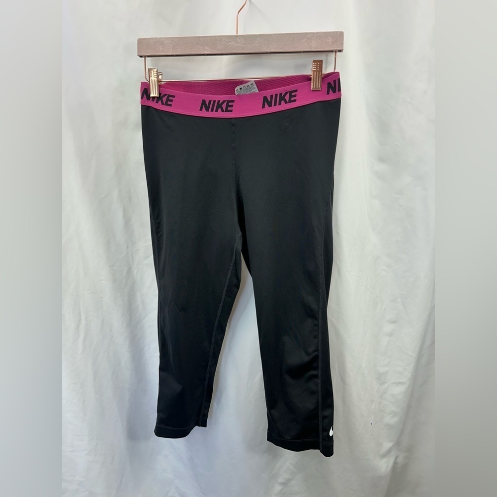 Nike Dri-fit black capris with pink band size L